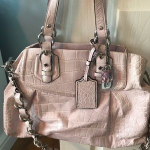 Used Pink Reptile Skin Coach